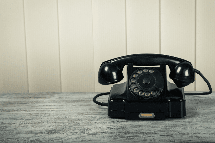 Old black rotary telephone