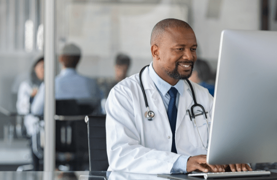 A doctor easily managing his email inbox and responding to queries 